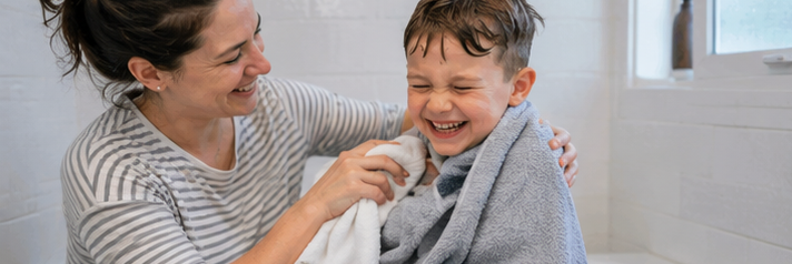 Autism caregiver and child moving through the morning routine together — the person doing the caring